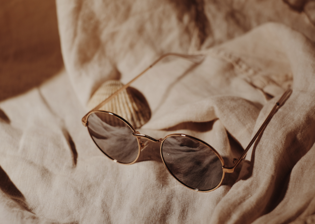 sunglasses on a white blanket | eco friendly sunglasses